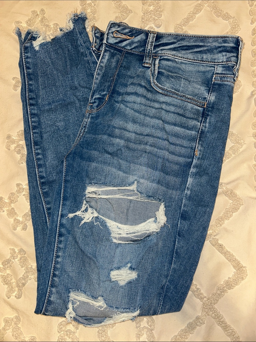 Women's Distressed Blue Denim Jeggings.